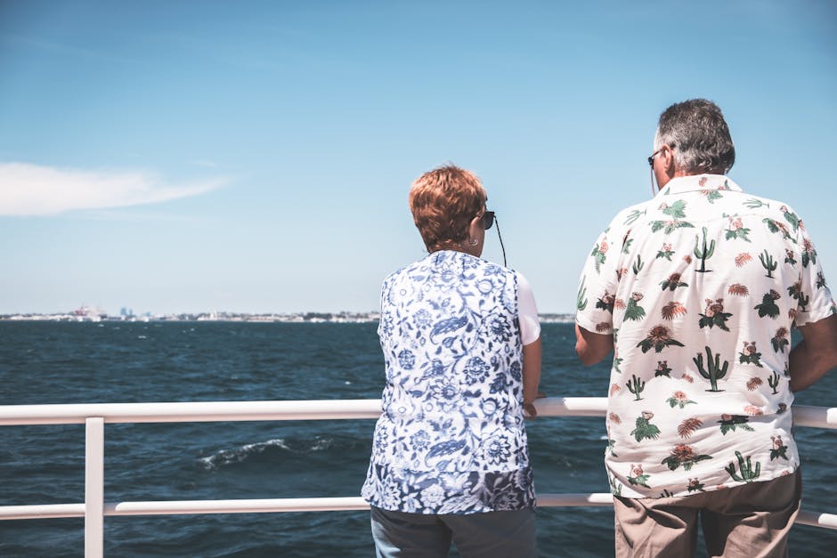 active traveler wellness cruise lifestyle couple overlooking the sea